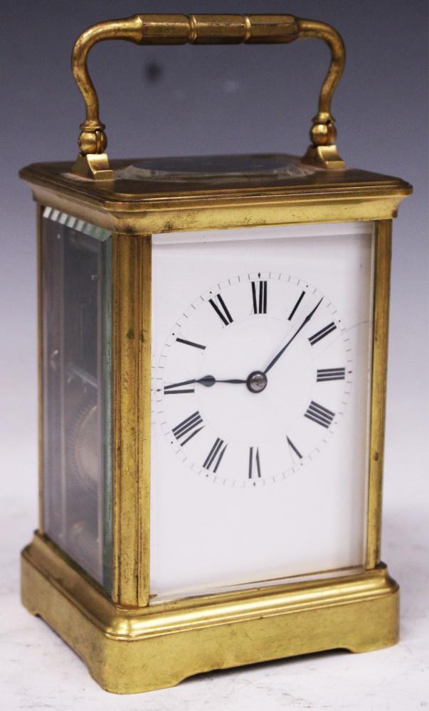 FRENCH BRASS CARRIAGE CLOCK, 5 1/4": In House Shipping within U.S. for $30 plus insurancePlease note: The auction house does not guarantee any of the clocks and watches are running or functioning properly.