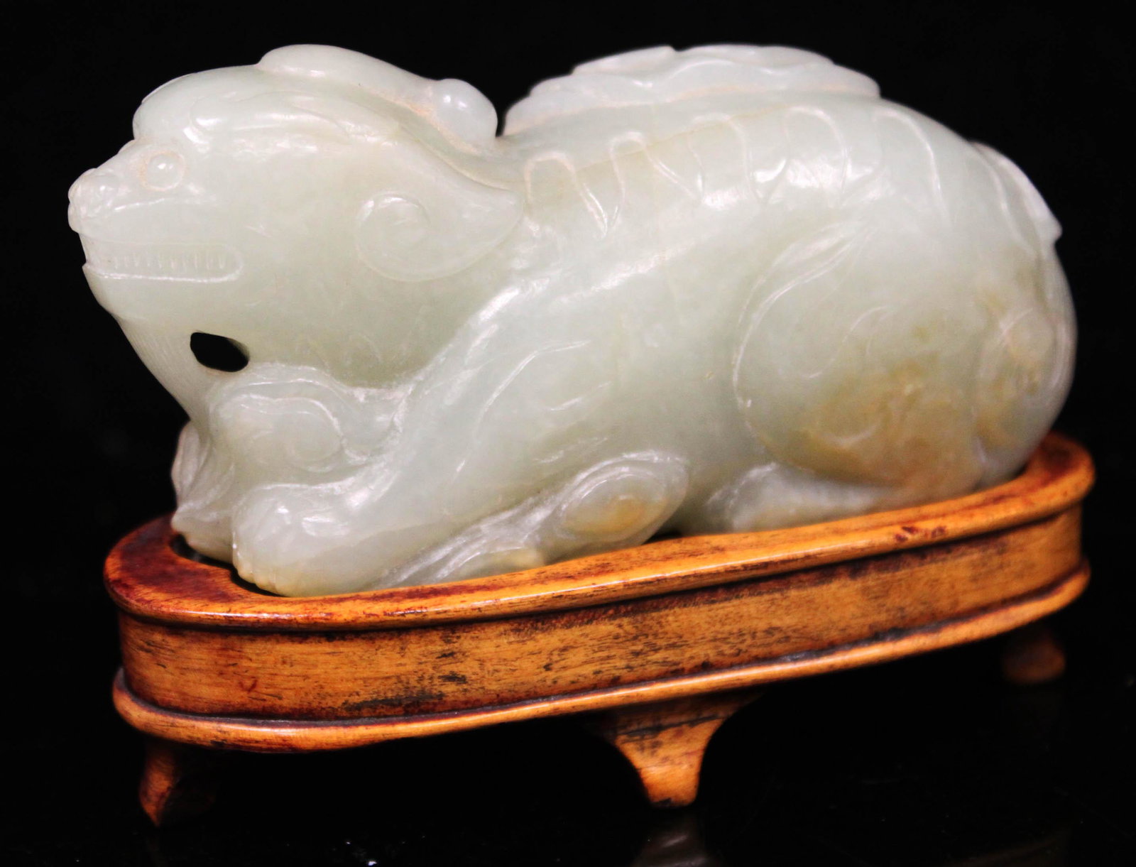 CHINESE CARVED JADE LION W/STAND, 19TH C. (1 of 4)