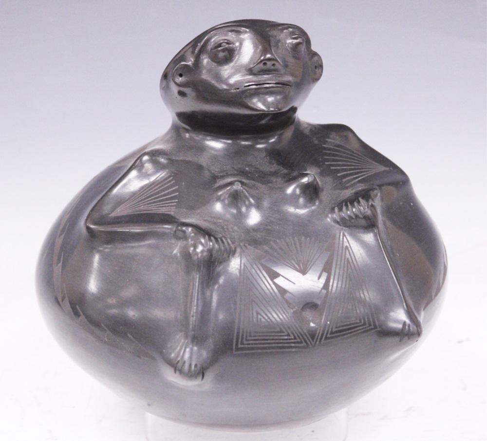 QUEZADA BLACK JAR WITH FIGURE OF FROG FACE: Height- 9" Diameter- 9 1/2"