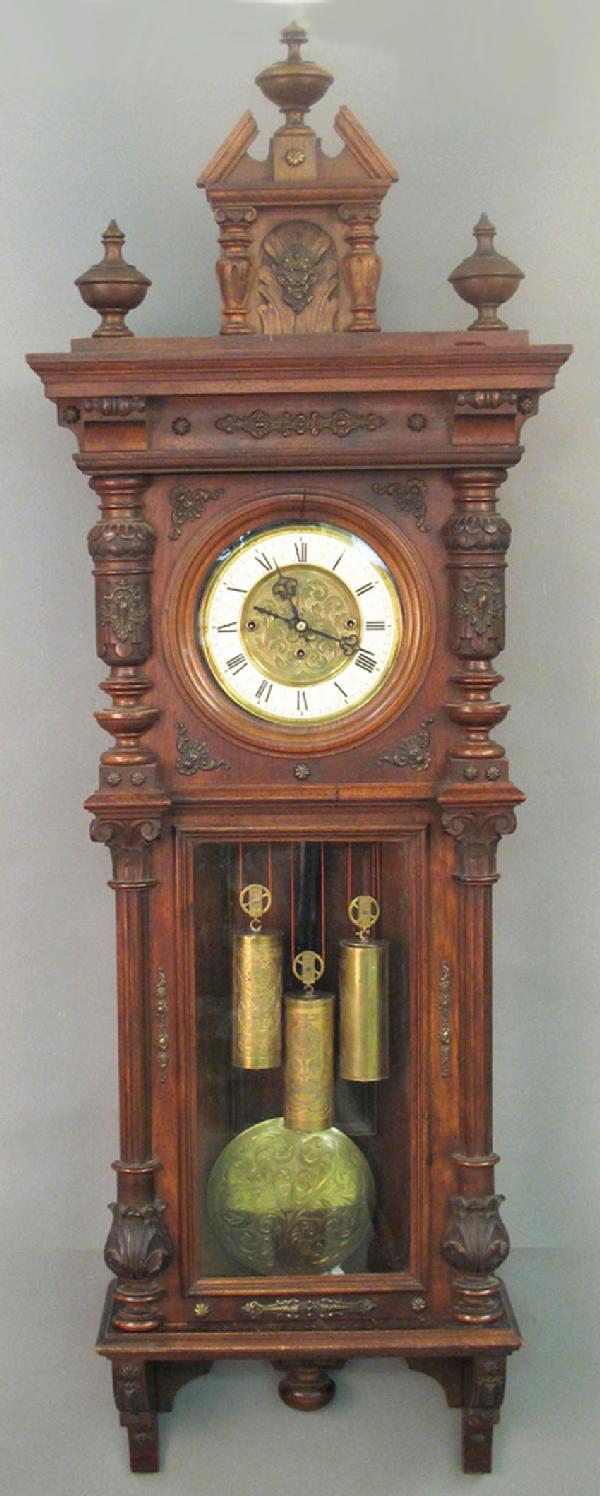 TRIPLE WEIGHT GERMAN WALNUT WALL CLOCK, 50": TRIPLE WEIGHT GERMAN WALNUT WALL CLOCK, 50"