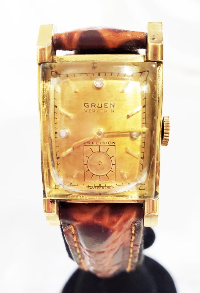 GRUEN 14KT DIAMOND VINTAGE MAN'S WRISTWATCH: with leather band Shipping U.S. $20 plus insurance