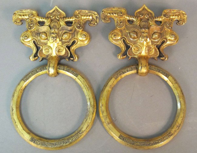 PAIR OF GILT BRONZE DOOR HANDLES, Yuanming Yuan: - PAIR OF GILT BRONZE DOOR HANDLES, Yuanming Yuan inscription:Qianlong Zaoban Chu, Geng Wu Nian Zhi, Chang Chun Yuan, Yu ling Long Guan, Tao Jia, after Wu length: 14", width" 8 1/2"