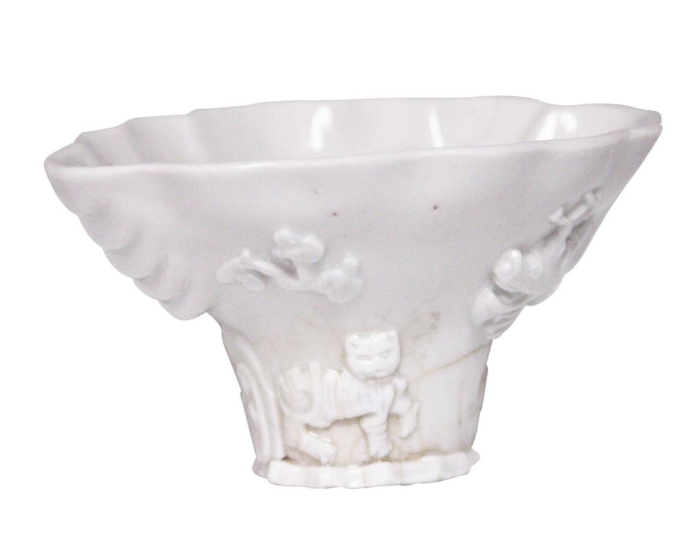 CHINESE BLANC DE CHINE VINTAGE WINE CUP: Possibly Qing Dynasty or earlier Height- 2 3/4" Width- 5 1/2" Buyer is responsible for pick up or arrange of shipment of this lot with 3rd party