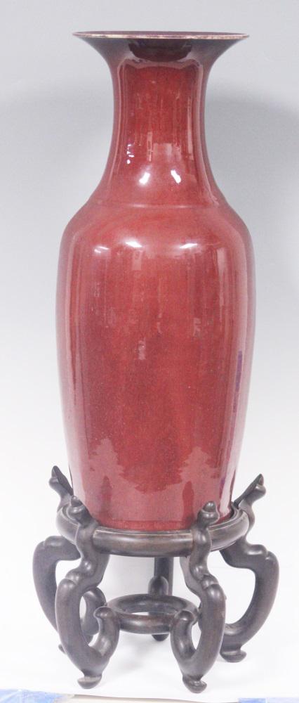 CHINESE QING DYNASTY SANG DE BOEUF GLAZE VASE: Height- 21" Overall- 27" (with stand) Third party shipping only for this lot
