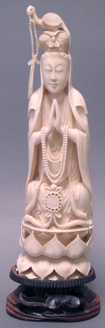 CHINESE CARVED IVORY STATUE OF FIGURE height of ivor: CHINESE CARVED IVORY STATUE OF FIGURE height of ivory: 11 5/8" note: minor loss to carving at tip of bird figure