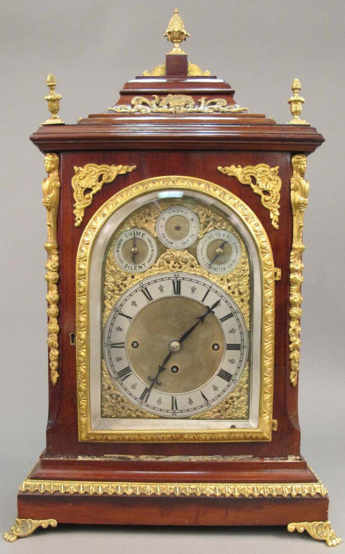ENGLISH MAHOGANY BRACKET CLOCK circa 19th century W: ENGLISH MAHOGANY BRACKET CLOCK circa 19th century Westminster and Eight Bell Chimes height: 27 1/4" estimate 3000-5000