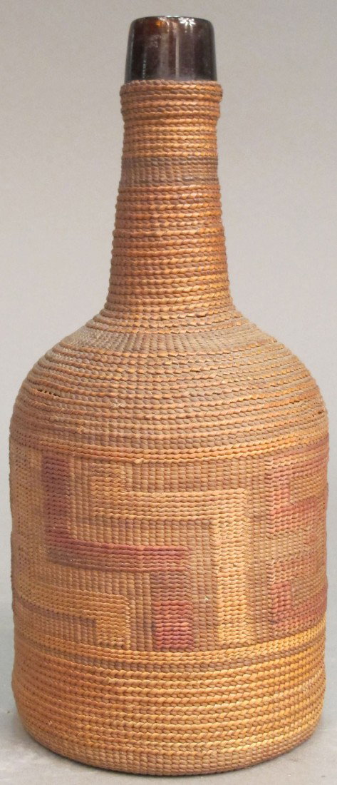 TLINGIT, BASKET OVER BOTTLE late 19th/early 20th : TLINGIT, BASKET OVER BOTTLE late 19th/early 20th century height: 9 5/8", depth: 4 1/4" estimate 300-500