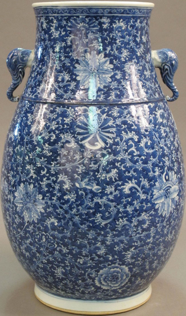 BLUE AND WHITE CHINESE PORCELAIN VASE with hand pa: BLUE AND WHITE CHINESE PORCELAIN VASE with hand painted rose blossoms height: 17 1/2" estimate 2500-3000