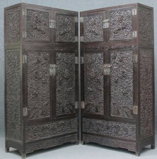 PAIR OF CHINESE CARVED STORAGE CABINETS with drago: PAIR OF CHINESE CARVED STORAGE CABINETS with dragon decorations height: 95", width: 47" depth: 21 1/2" estimate 20,000-30,000