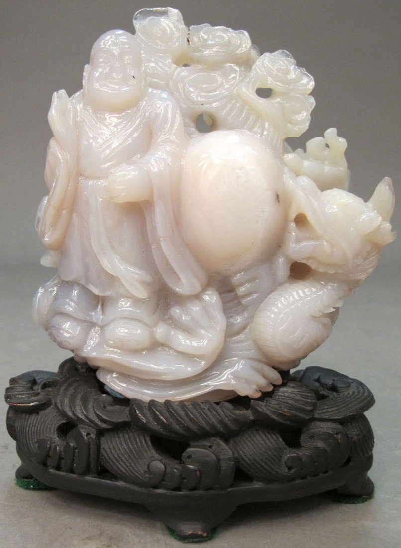 CHINESE CARVED HARDSTONE OF BUDDHA AND DRAGON on s: CHINESE CARVED HARDSTONE OF BUDDHA AND DRAGON on stand height on stand: 6 1/4" estimate 300-500