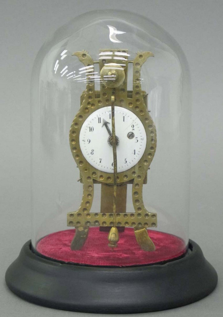 CONTINENTAL EASEL FORM CLOCK with glass dome ci: CONTINENTAL EASEL FORM CLOCK with glass dome circa 19th century height- 5"