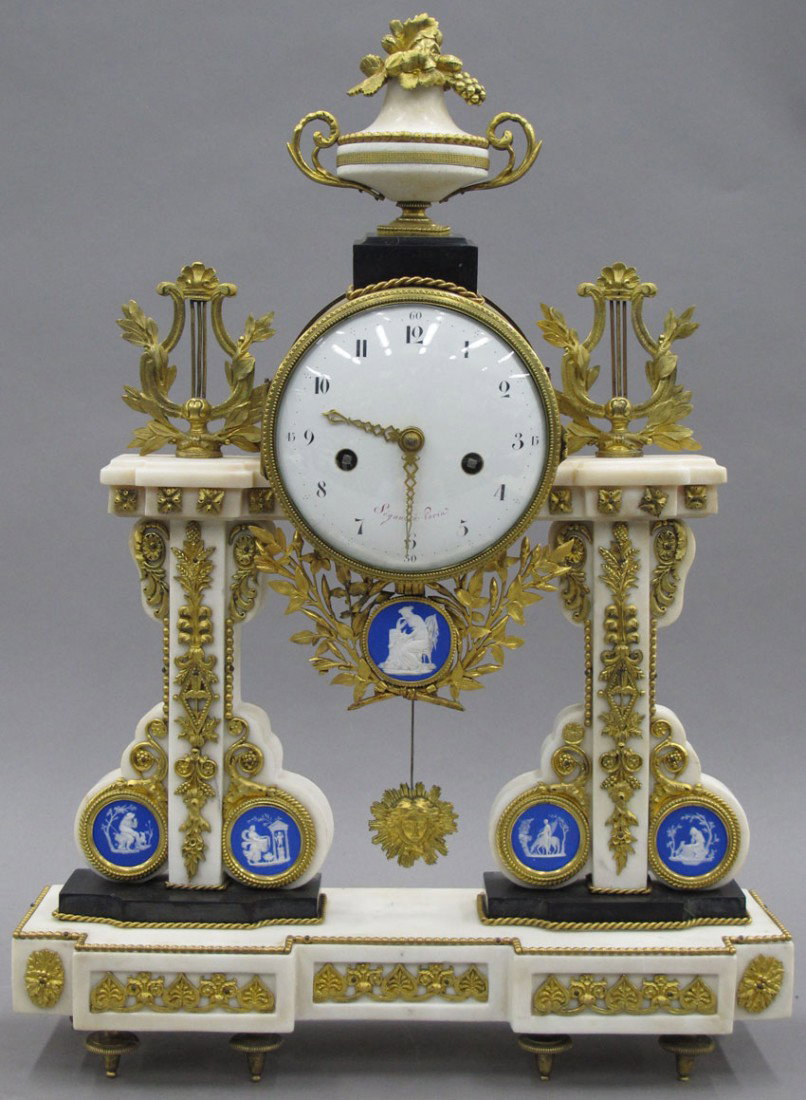 FRENCH EMPIRE MARBLE MANTLE CLOCK with gilt met: FRENCH EMPIRE MARBLE MANTLE CLOCK with gilt metal mounts and porcelain plaques height- 20", width 15 1.2"