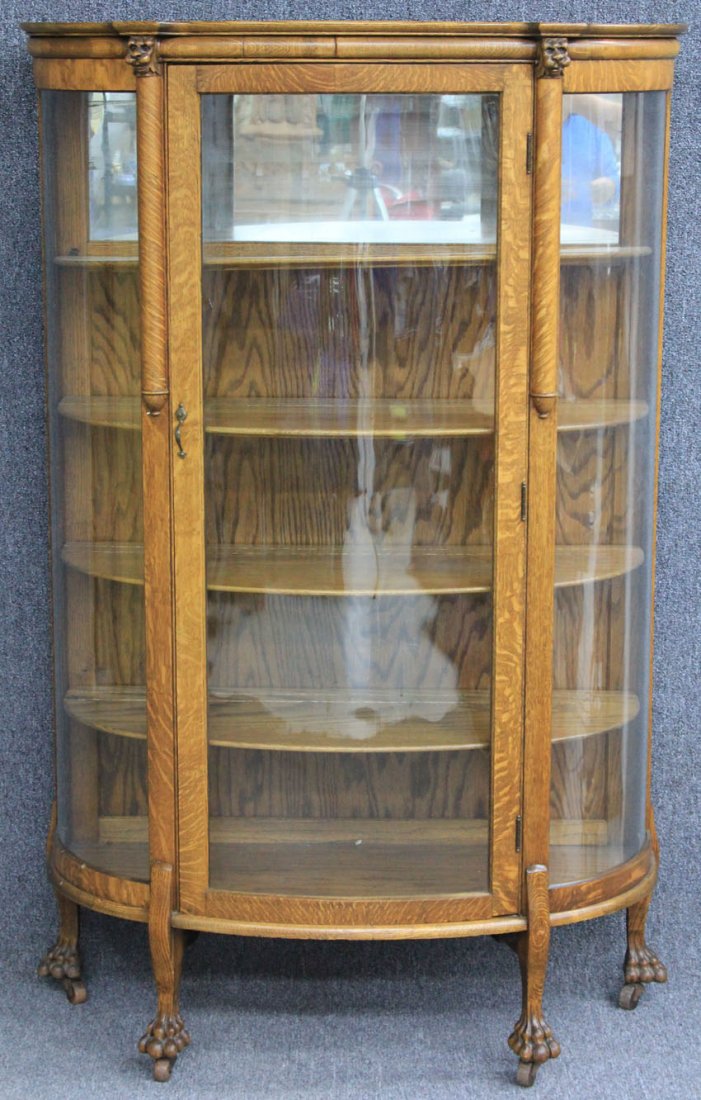AMERICAN CARVED OAK CHINA CABINET with curved g: AMERICAN CARVED OAK CHINA CABINET with curved glass front height- 64" width- 40"
