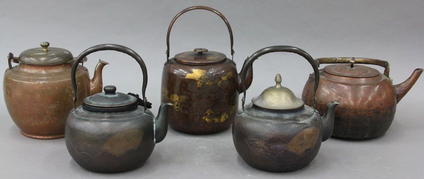 LOT OF (5) JAPANESE HAMMERED COPPER TEAPOTS ear: LOT OF (5) JAPANESE HAMMERED COPPER TEAPOTS early 20th century heights- 5 1/4"- 6 3/4" note- Carmel Estate