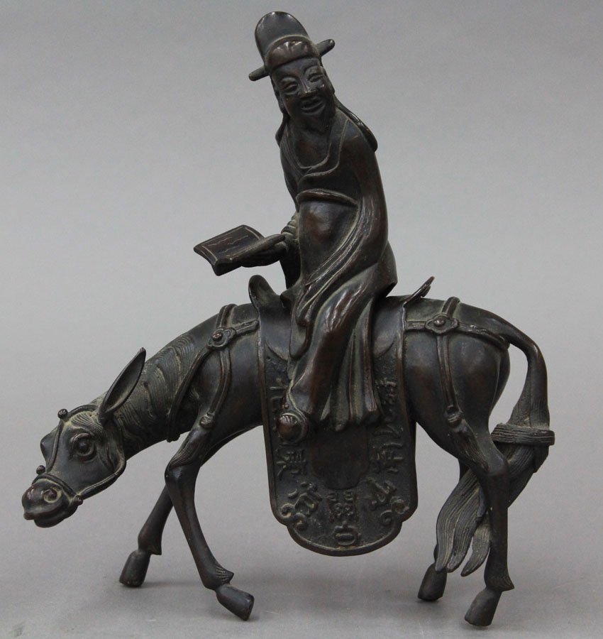CHINESE BRONZE OF LOHAN FIGURE ON HORSE note- d: CHINESE BRONZE OF LOHAN FIGURE ON HORSE note- damage to ear height- 8 1/2"