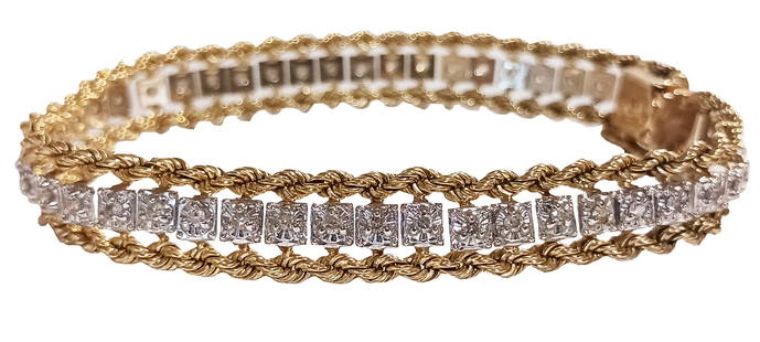 LADYS (49) DIAMOND ROPE 14KT TWIST BRACELET: Approx. 1.0 CT TW Weight- 14.6 grams Length- 7" Shipping U.S. $15 plus insurance