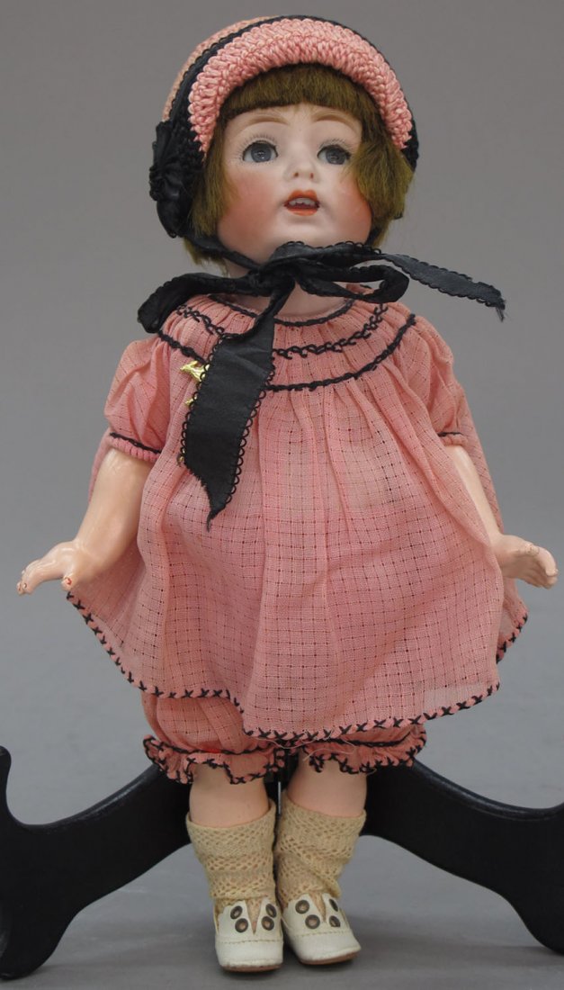 EARLY 20TH CENTURY GERMAN DOLL: EARLY 20TH CENTURY GERMAN DOLL with period costume length- 10 1/4"