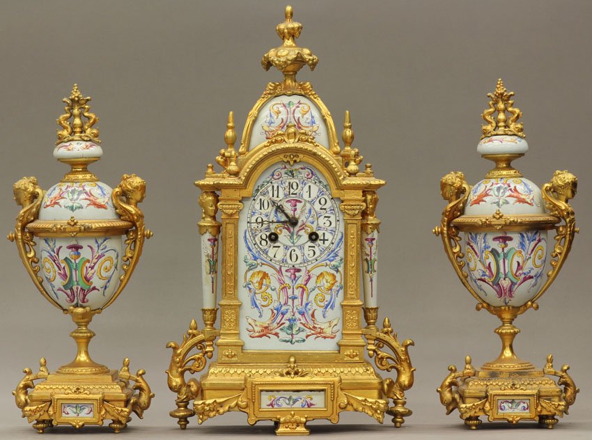 FRENCH THREE PART CLOCK SET with paint decorated : FRENCH THREE PART CLOCK SET with paint decorated case and urns height of clock- 15 1/2"