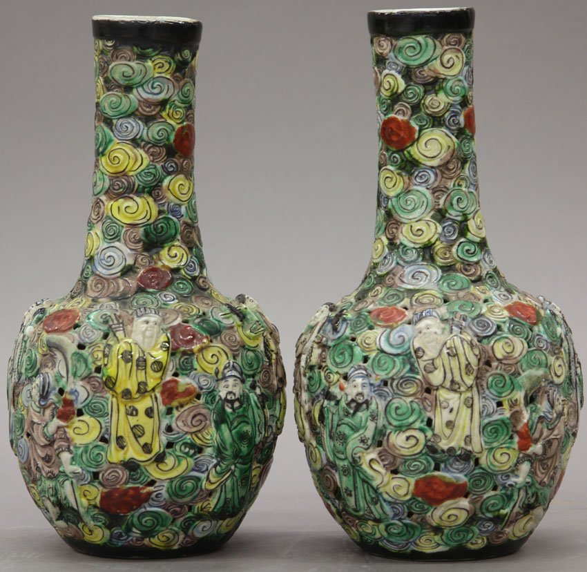 PAIR OF CHINESE POLYCHROME CERAMIC RETICULATED SC: PAIR OF CHINESE POLYCHROME CERAMIC RETICULATED SCULPTED VASES with stamp mark circa early 20th century height- 9 1/2"