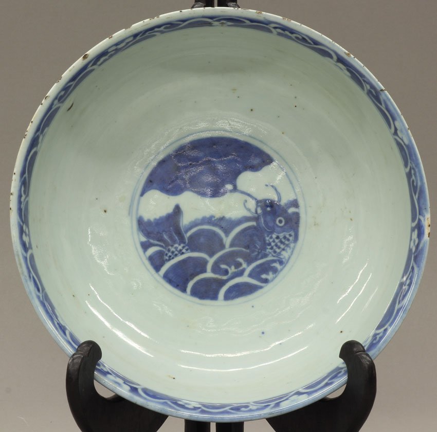 QING DYNASTY BLUE AND WHITE PORCELAIN CENTER BOWL: QING DYNASTY BLUE AND WHITE PORCELAIN CENTER BOWL with enameled decoration and four character mark diameter- 10 1/4" note- chips on rim