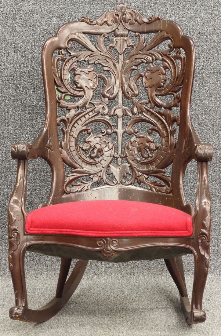 VICTORIAN CARVED MAHOGANY ROCKING CHAIR in the ma: VICTORIAN CARVED MAHOGANY ROCKING CHAIR in the manner of J.H.Belter height- 40", width- 25"