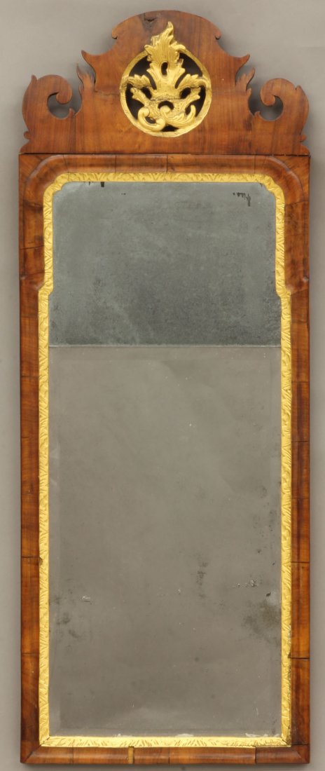 QUEEN ANNE PARCEL-GILT WALL MIRROR American or Engl: QUEEN ANNE PARCEL-GILT WALL MIRROR American or English circa 1730-1760 length- 37 1/2"