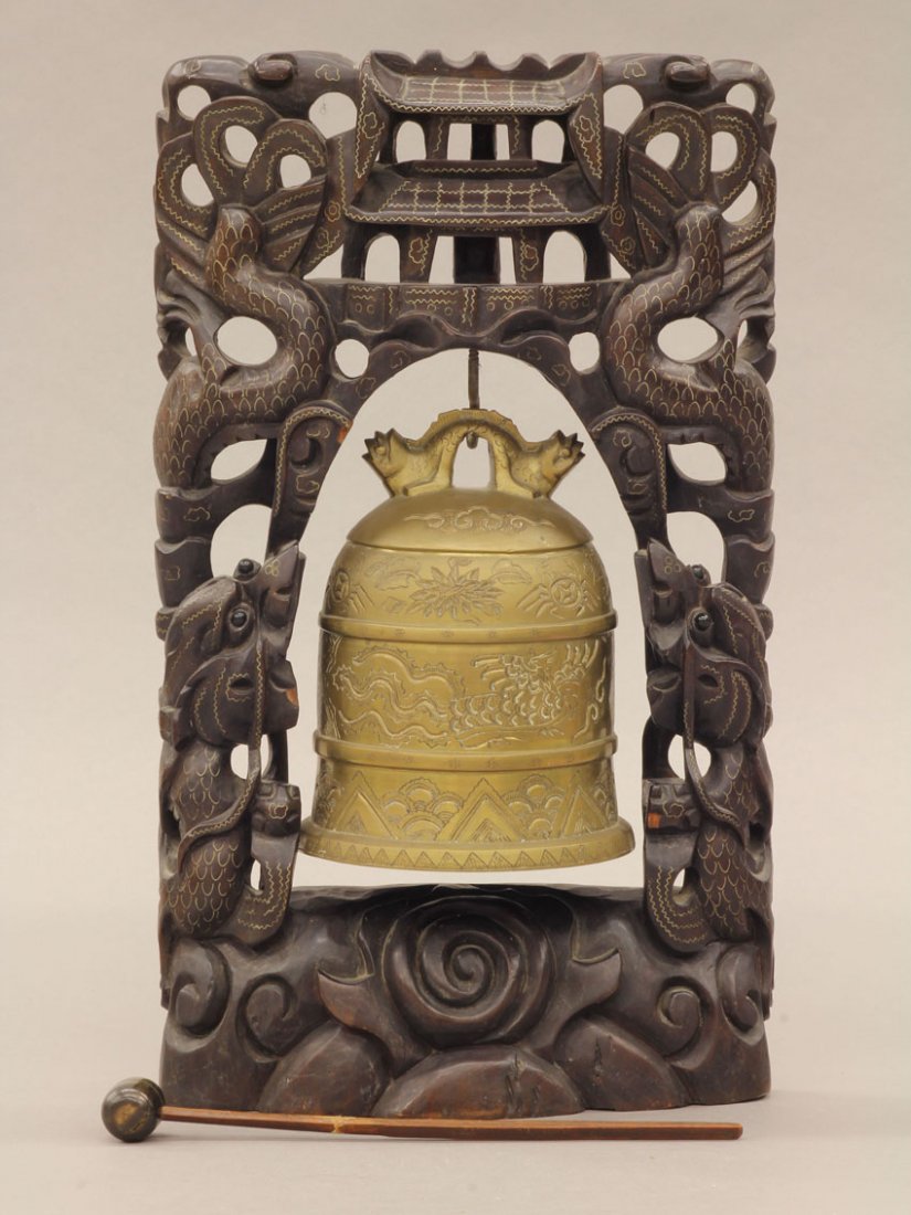CHINESE CARVED WOOD STAND with metal bell note- in: CHINESE CARVED WOOD STAND with metal bell note- inlaid with silver wire work height- 14"