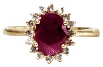 LADYS 14KT RUBY CENTER STONE W/ DIAMONDS RING