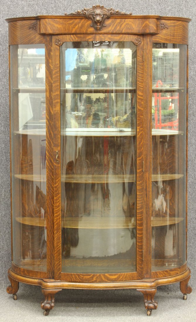 AMERICAN OAK CURVED GLASS CHINA CABINET circa 1900 heig: AMERICAN OAK CURVED GLASS CHINA CABINET circa 1900 height- 70", width- 44" note- this cabinet had columns at one time