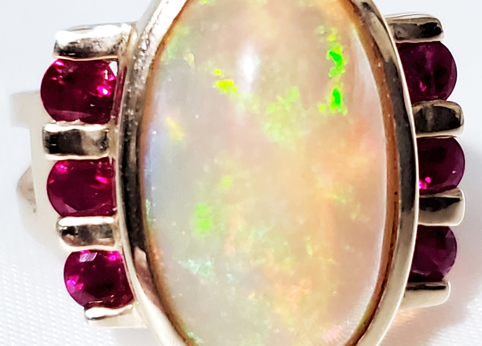 LADYS 14KT OPAL & RUBY Y.G. RING - 7