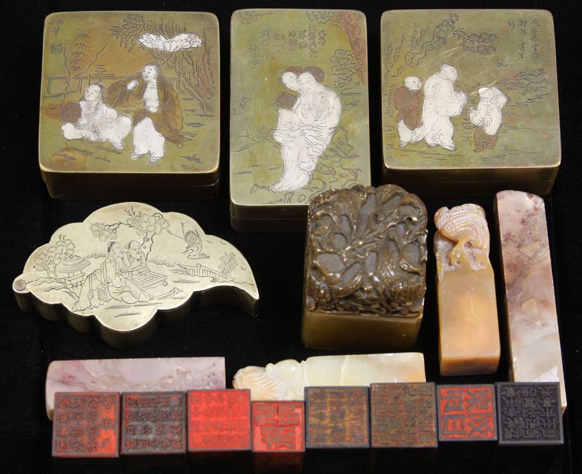 LARGE ASSORTMENT OF CHINESE CARVINGS, BOXES: soapstone, seals total of (17) pcs. Height- 2"- 2 1/2" Condition: some chips to seals