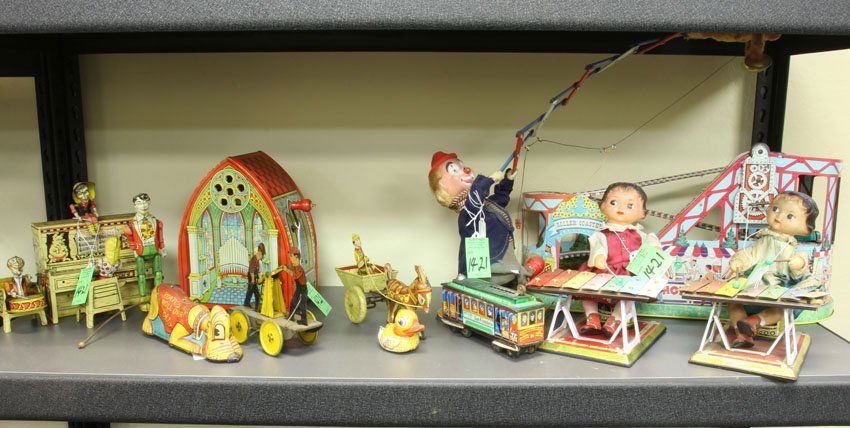 LOT OF (11) VINTAGE TOYS: Roller coaster, Little Abner, trains, clown,organ Condition: all over wear