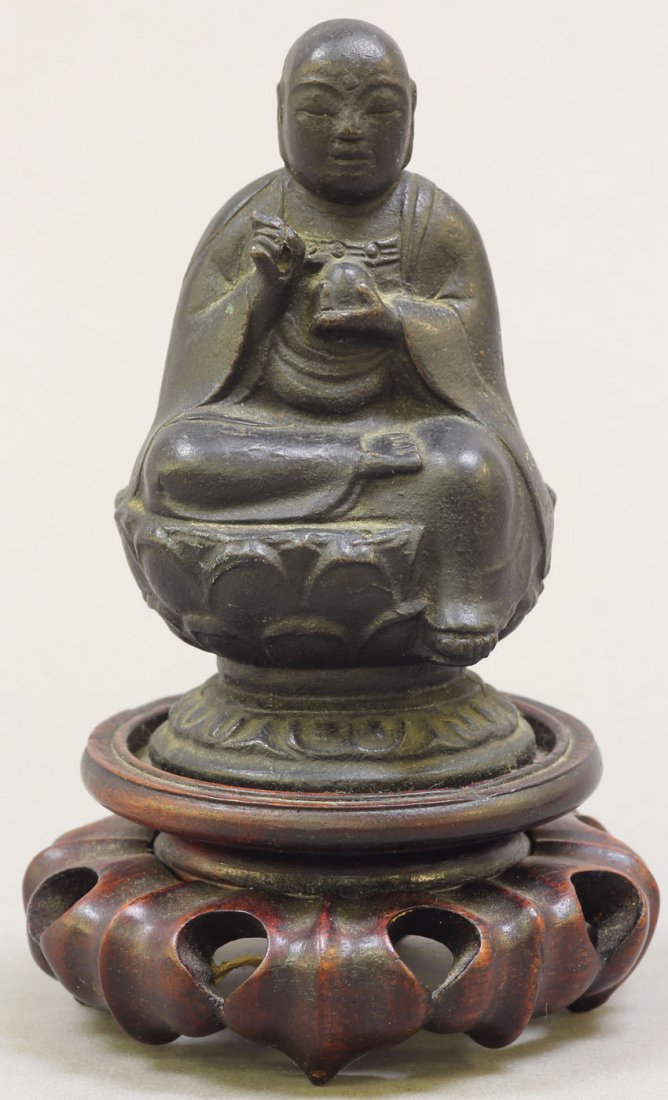ASIAN BRONZE BUDDHA: Overall height- 4 3/4" Condition: some loss to patina