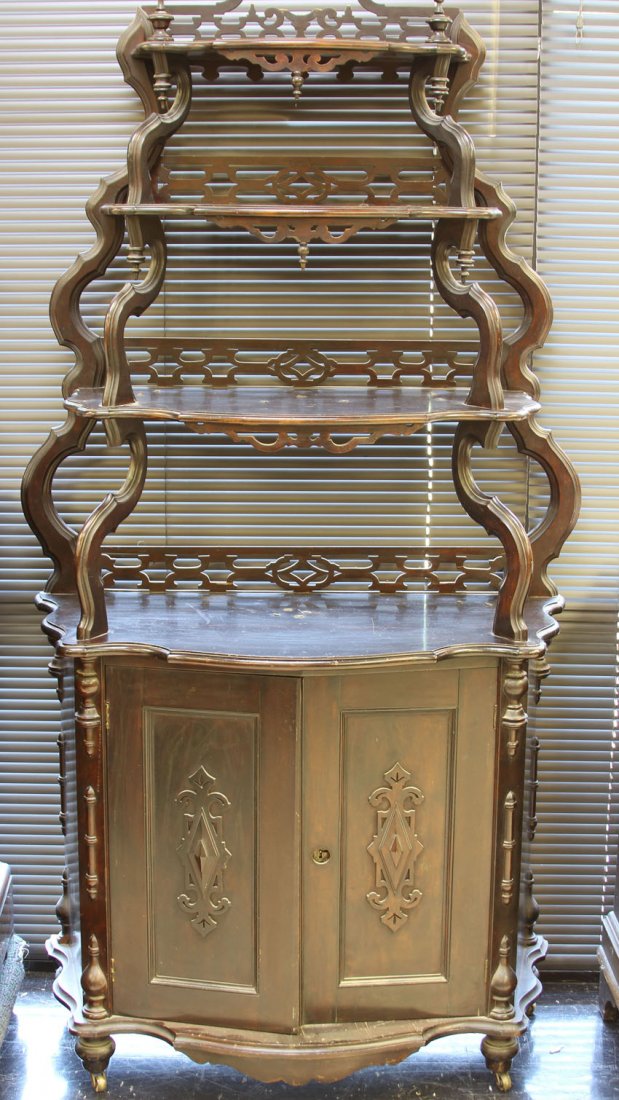 VICTORIAN DISPLAY SHELF WITH CABINET BASE: Height- 64" Condition: loss to carvings on crest