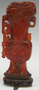 EARLY CHINESE CARVED AMBER VASE: 19th century or earlier Overall Height- 9 1/2" Condition: crack through lid