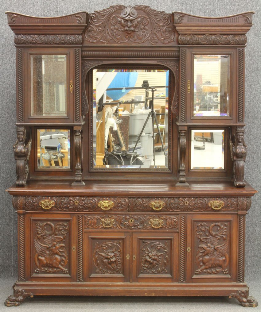 VICTORIAN CARVED OAK SIDEBOARD WITH MAIDENS: Height- 96", Width- 79" Condition: some separations, original finish