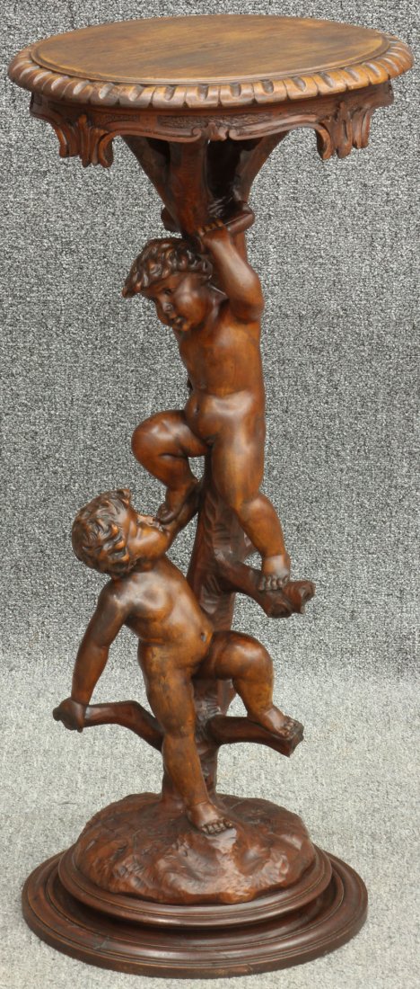 ITALIAN CARVED WALNUT FIGURAL PEDESTAL: circa late 19th century Height- 34 1/4"