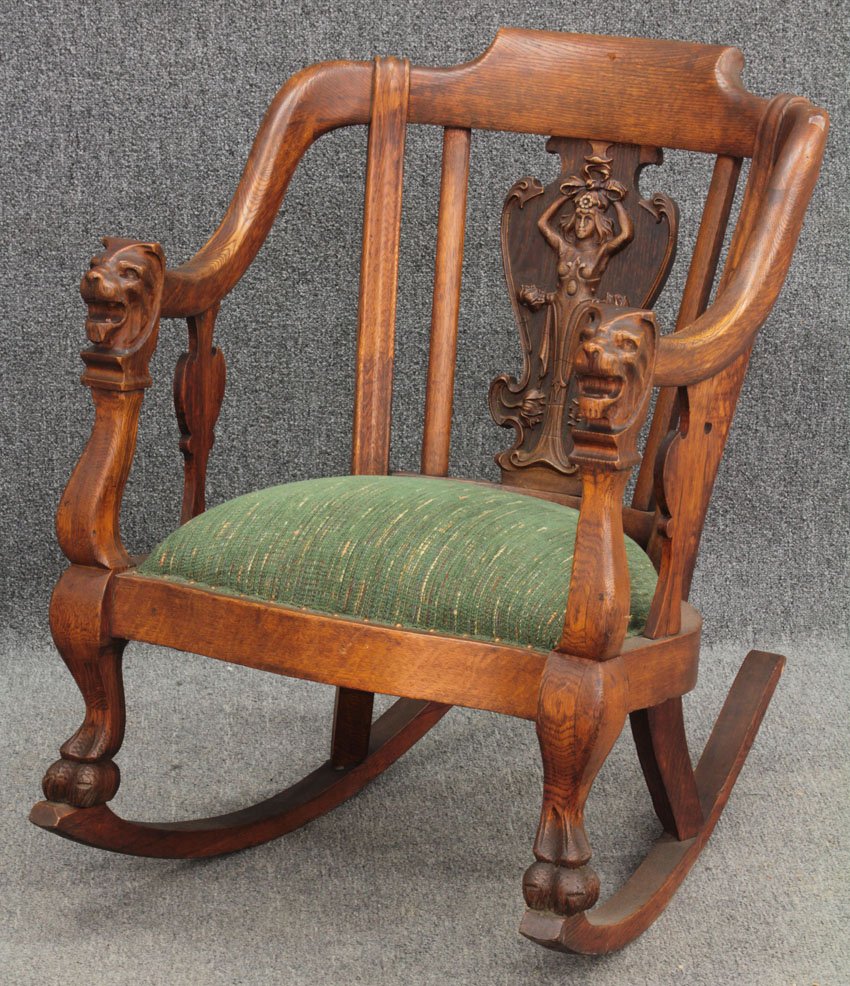 VICTORIAN CARVED OAK ROCKING CHAIR: with lion's mask Height- 35 1/4"