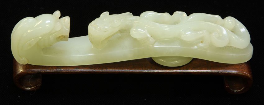 CHINESE CARVED JADE BELT HOOK WITH STAND: Length of jade- 4" Condition: one foot broken off dragon