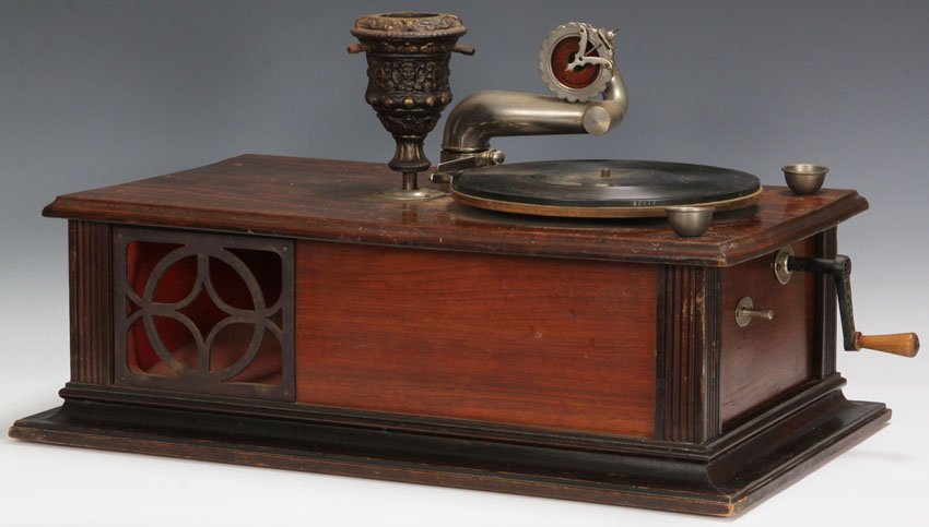 EARLY 20TH CENTURY PHONOGRAPH: with metal stand for Christmas tree which rotates and plays records Height- 8", Length- 23 1/2"