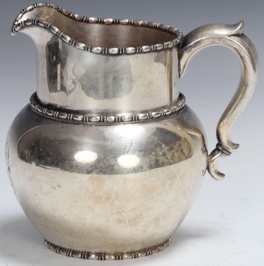 BIGELOW, KENNARD & CO. STERLING SILVER PITCHER: Height- 7 1/2" Weight- 22.7 troy oz. note- monogramed