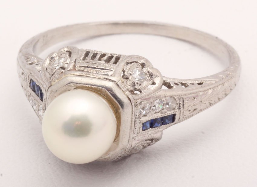 PLATINUM LADIES DIAMOND RING WITH PEARL: Weight- 4.7 grams Note- pearl was added later