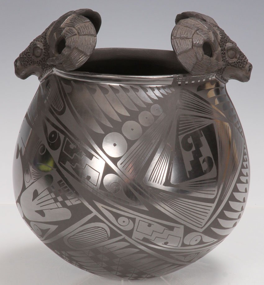 BLACK CARVED INDIAN POT WITH STAND: Mata Ortiz Height- 8"