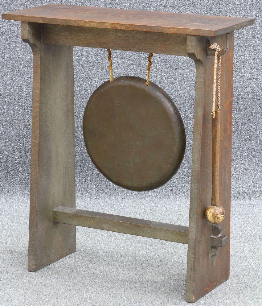 GUSTAV STICKLEY OAK DINNER GONG, #814: Diameter of metal gong- 15 7/8" Height- 35 1/2", width- 31"Unsigned