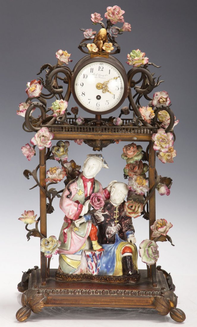 FRENCH PORCELAIN AND METAL MOUNTED CLOCK: S&G Gump Co., San Francisco early 20th century Height- 16"