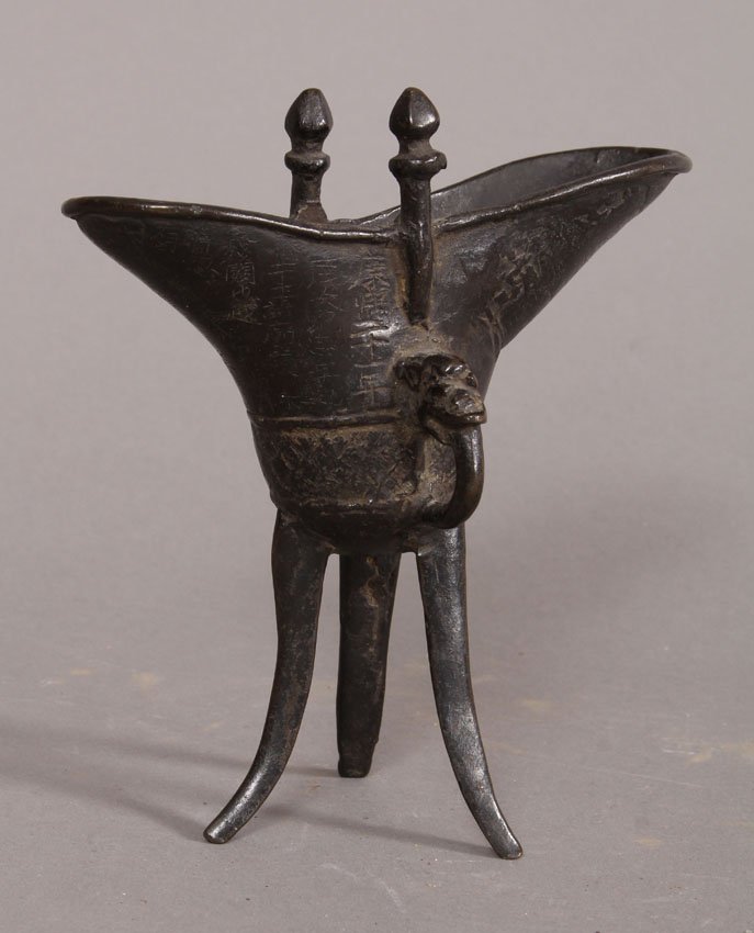 EARLY CHINESE BRONZE LIBATION CUP: Height- 6 1/8" Weight- 17.9 troy oz. Chinese script over body of cup