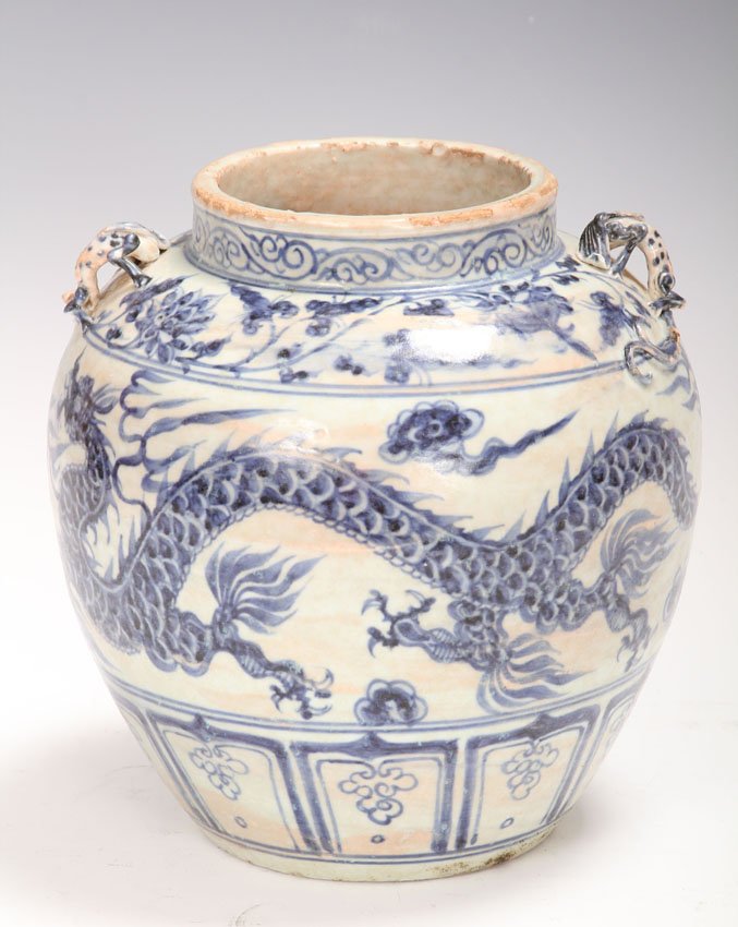 CHINESE BLUE AND WHITE POTTERY VESSEL: Height- 7 3/4" Condition- breaks, chips, tail missing, chips around rim