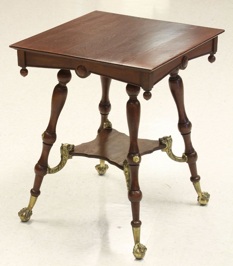 LATE VICTORIAN CHERRY SQUARE TABLE: with cast metal griffin supports Height- 29", Top- 23" x 23"