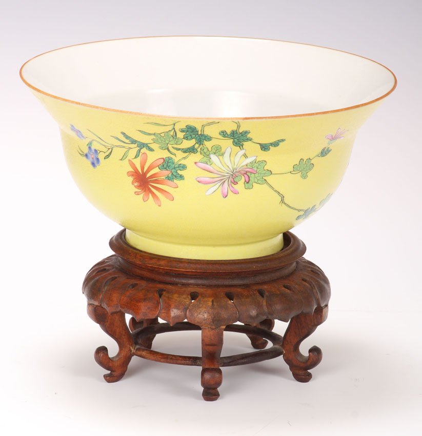 IMPERIAL YELLOW CHINESE PORCELAIN BOWL: Qianlong mark, to be sold with stand Featured in Arts of Asia Magazine advertisement 1977 Height- 3 1/2", Diameter- 7 5/8"