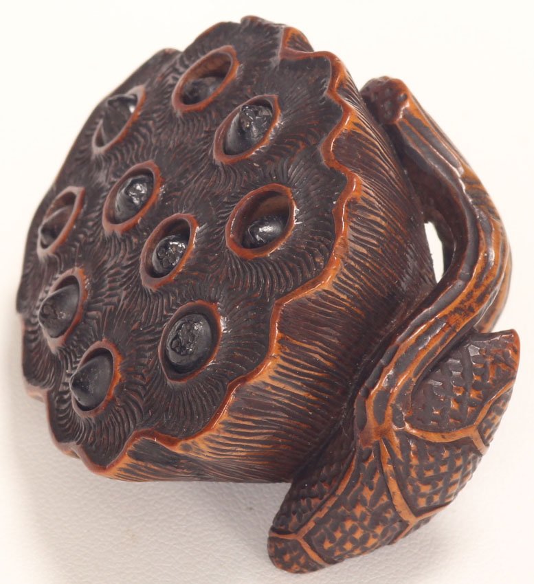 TAMETAKA, KITA SIGNED NETSUKE: Lotus, 19th century Length- 1 3/4"